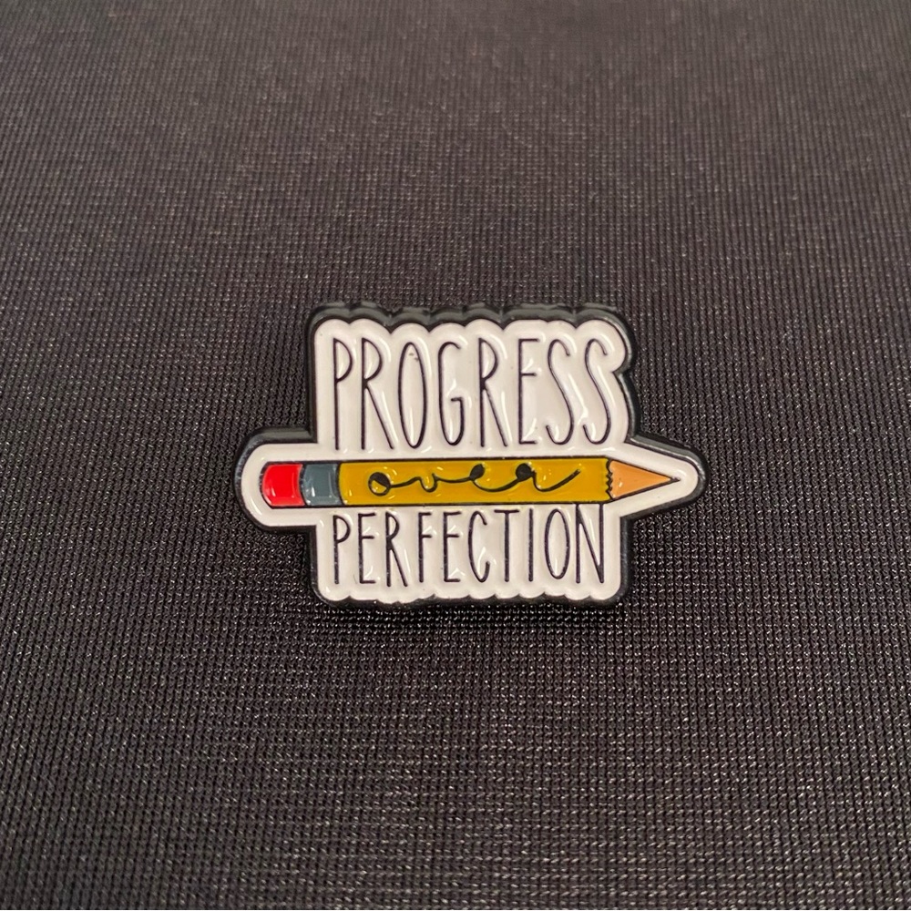 Enamel pin/magnet puts the focus where it helps the most 3FER